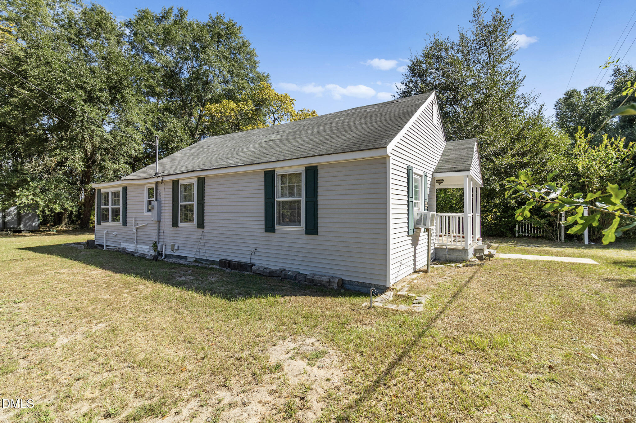 101 Doby Drive Raeford, NC 28376 - Photo 4 of 22 a view of a house with a yard