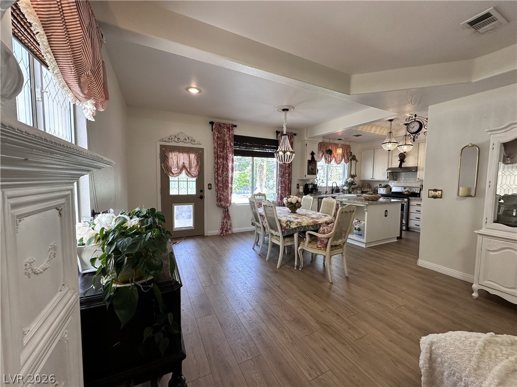 9724 Trail Rider Drive Las Vegas, NV 89117 - Photo 29 of 52 Dining area featuring dark wood-style floors and recessed lighting