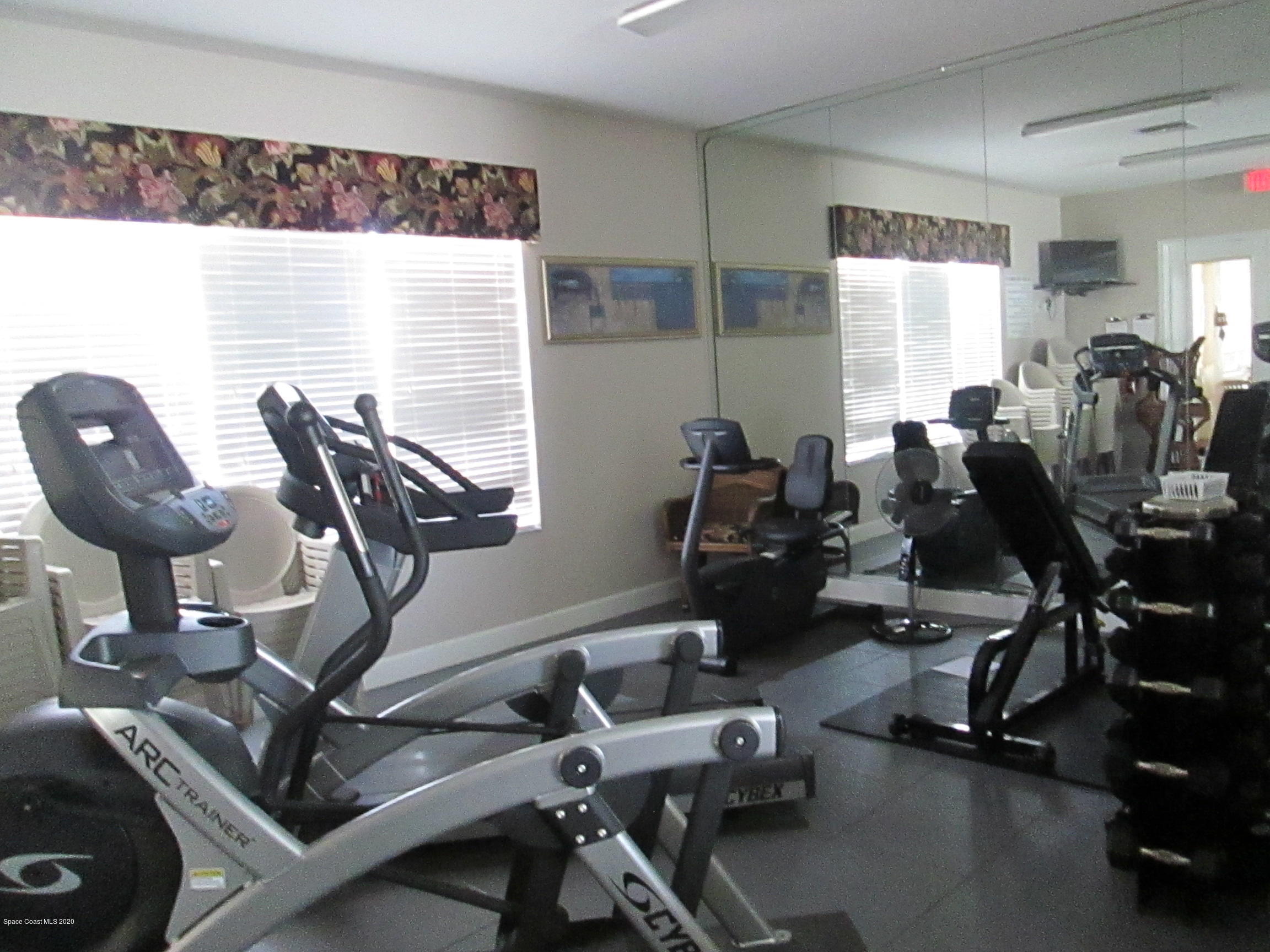 3652 Shawnee Lane Melbourne, FL 32901 - Photo 31 of 34 a view of a room with gym equipment