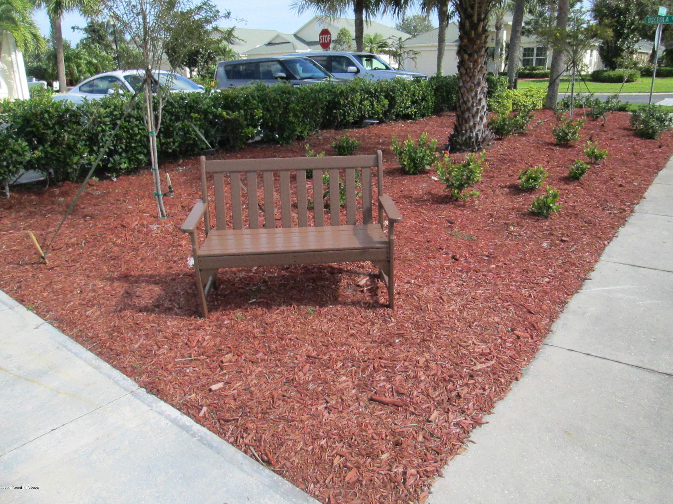 3652 Shawnee Lane Melbourne, FL 32901 - Photo 33 of 34 a view of a backyard with wooden fence
