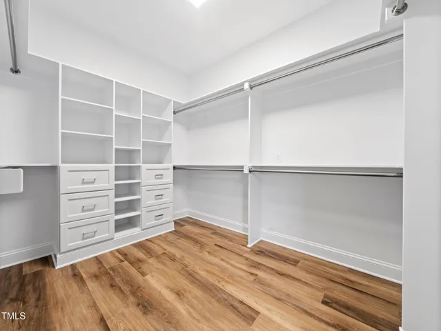 a view of an empty walk in closet