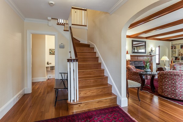 92 Varick Road Newton, MA 02468 - Photo 3 of 24 a view of entryway and hall with wooden floor