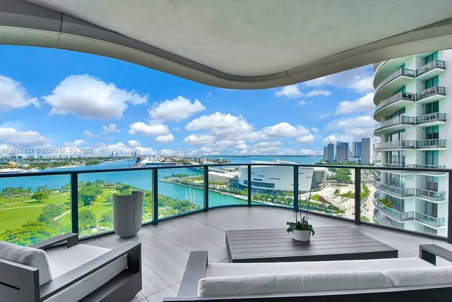 a view of a lake with a building in the background