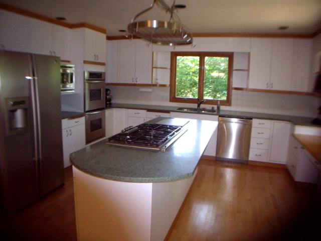 2979 West Forest Road Freeport, IL 61032 - Photo 3 of 9 a kitchen with stainless steel appliances granite countertop a sink a stove a refrigerator a window and cabinets