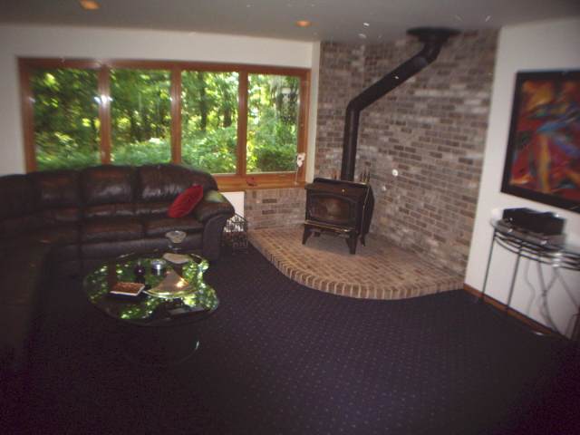 2979 West Forest Road Freeport, IL 61032 - Photo 8 of 9 a living room with furniture and a fireplace