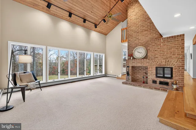 a kitchen with a sink cabinets and window