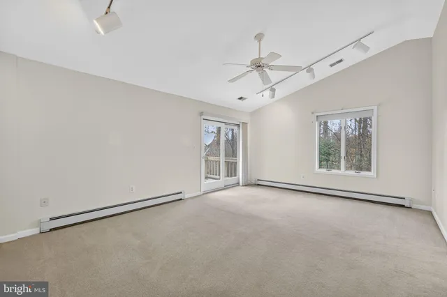 a view of balcony with wooden floor