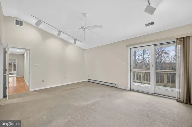 a view of a house with a roof deck