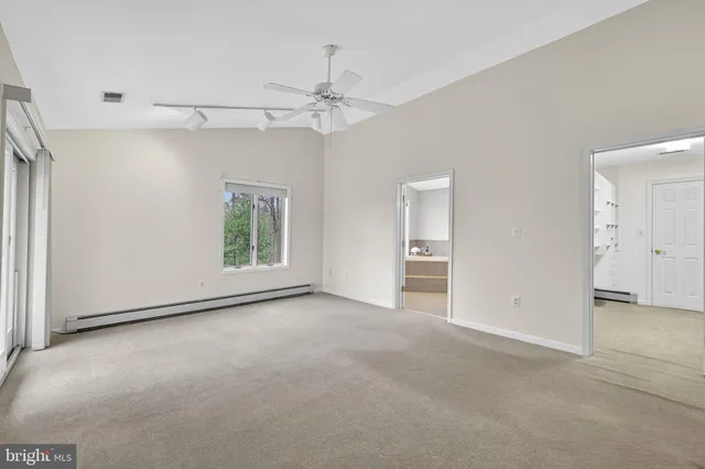 a view of balcony with wooden floor and fence