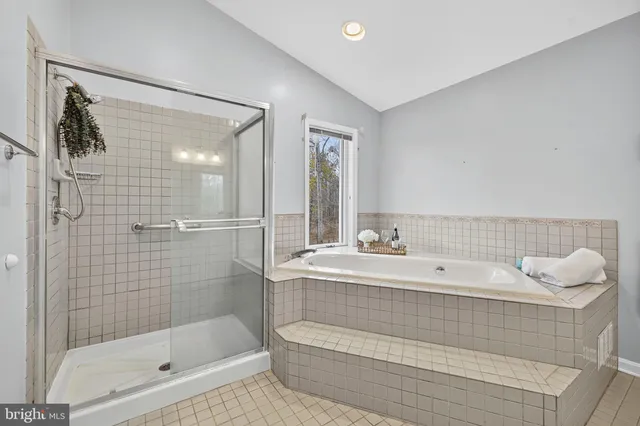 a view of a swimming pool with an outdoor seating and a yard