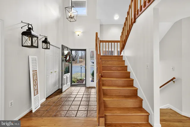 a view of a livingroom with furniture and a fireplace