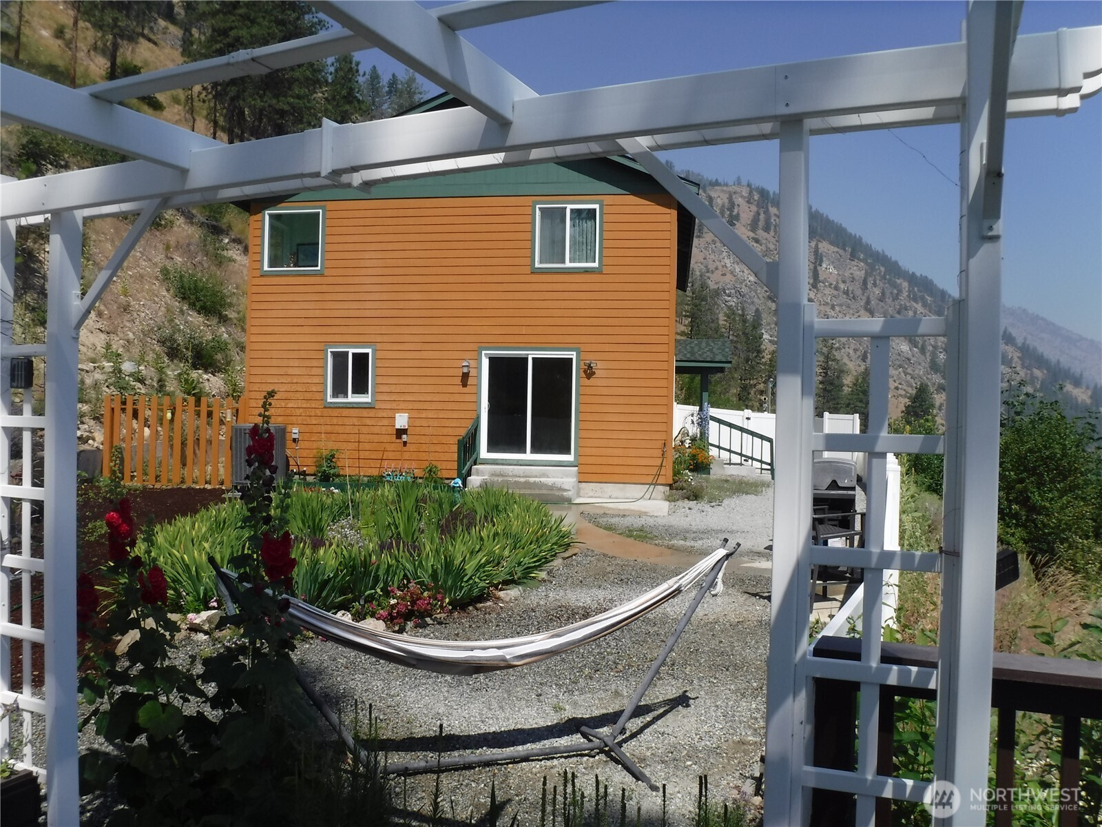165 Granite Falls Road Chelan, WA 98816 - Photo 7 of 27 a front view of a house with garden