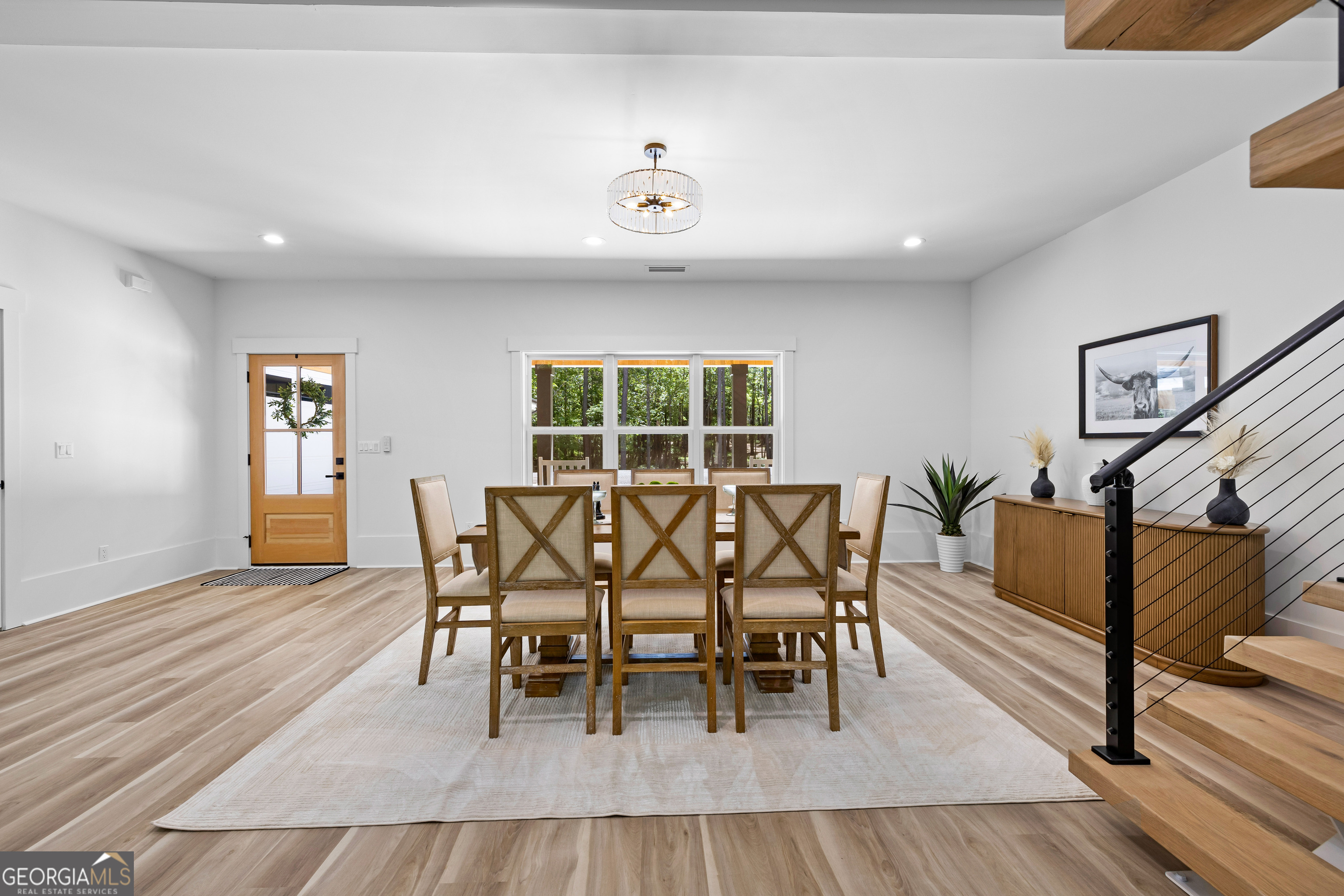 354 Turner Road Newnan, GA 30263 - Photo 13 of 79 a dining room with furniture and wooden floor