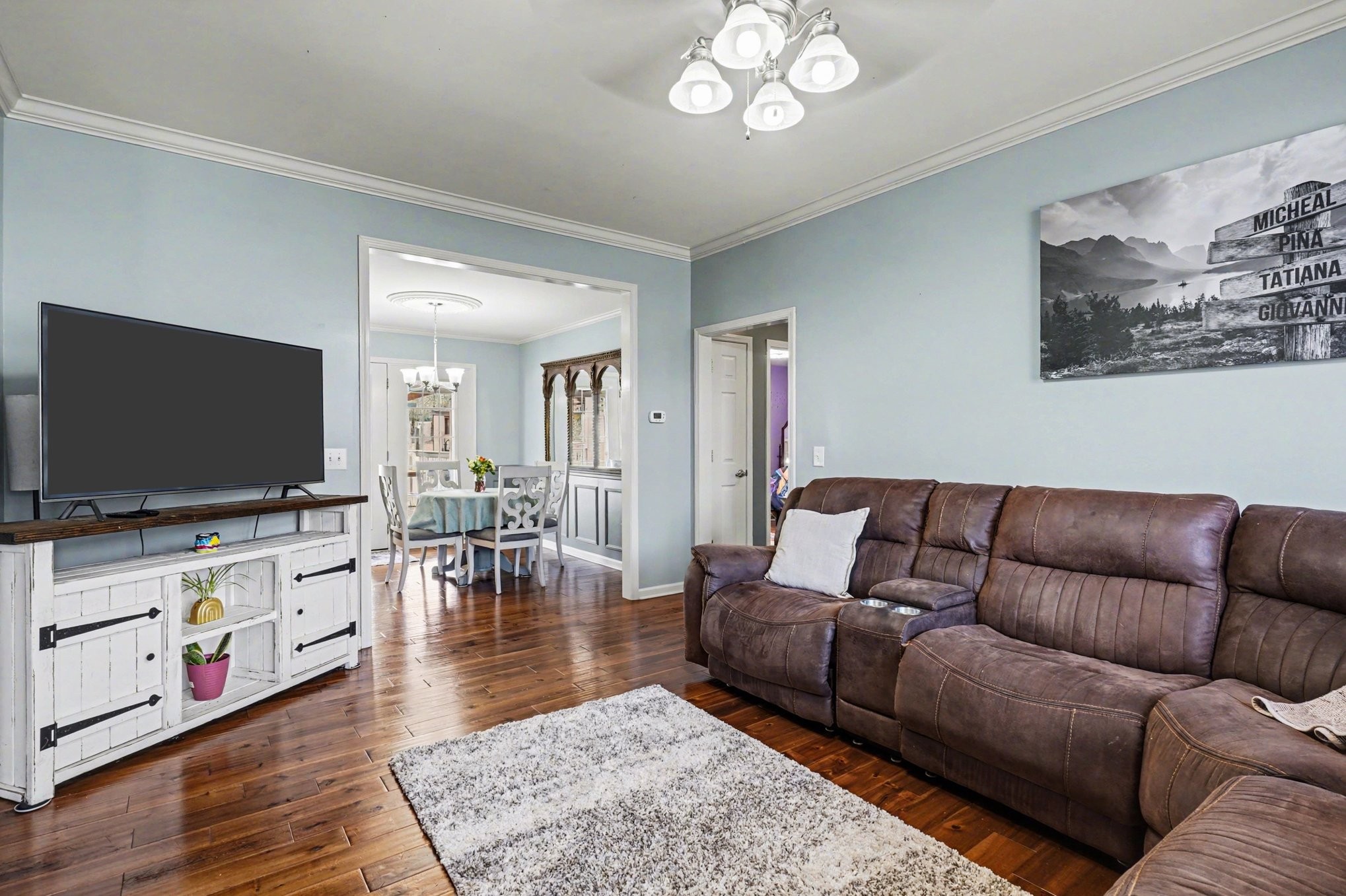 1510 Rapids Road Portland, TN 37148 - Photo 12 of 33 a living room with furniture and a flat screen tv