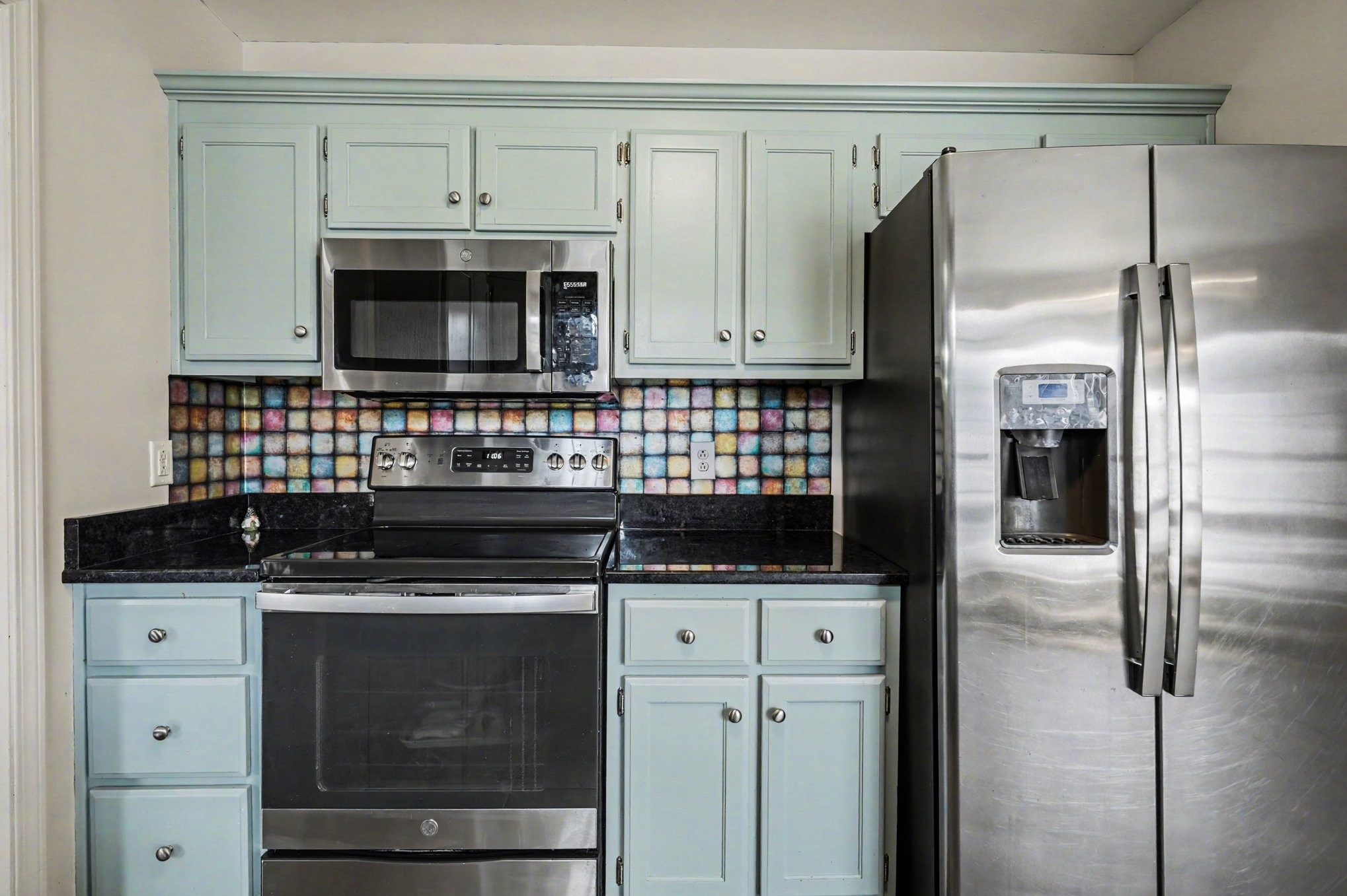 1510 Rapids Road Portland, TN 37148 - Photo 15 of 33 a kitchen with stainless steel appliances granite countertop a stove and a refrigerator
