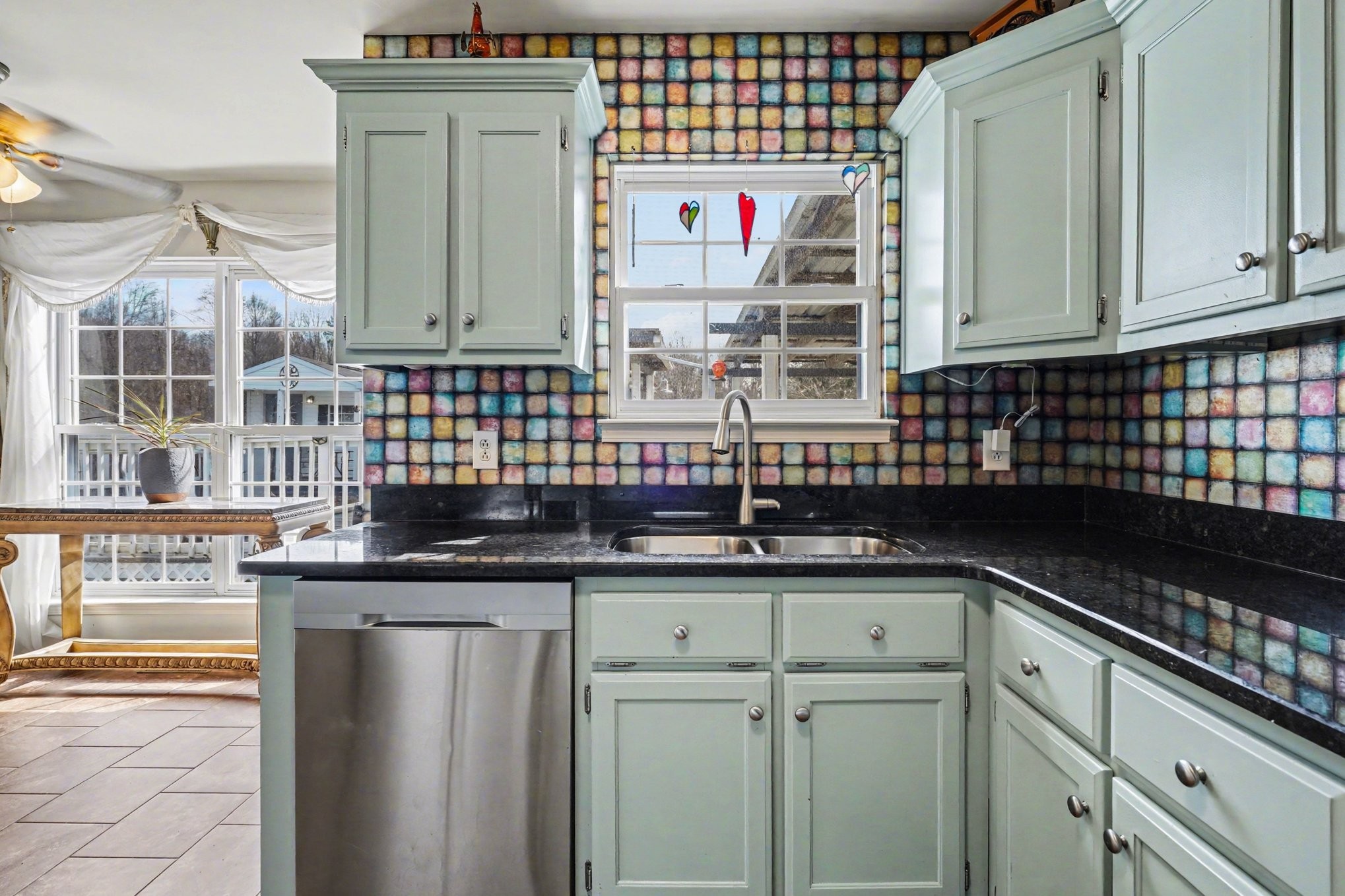 1510 Rapids Road Portland, TN 37148 - Photo 16 of 33 a kitchen with granite countertop a sink and cabinets