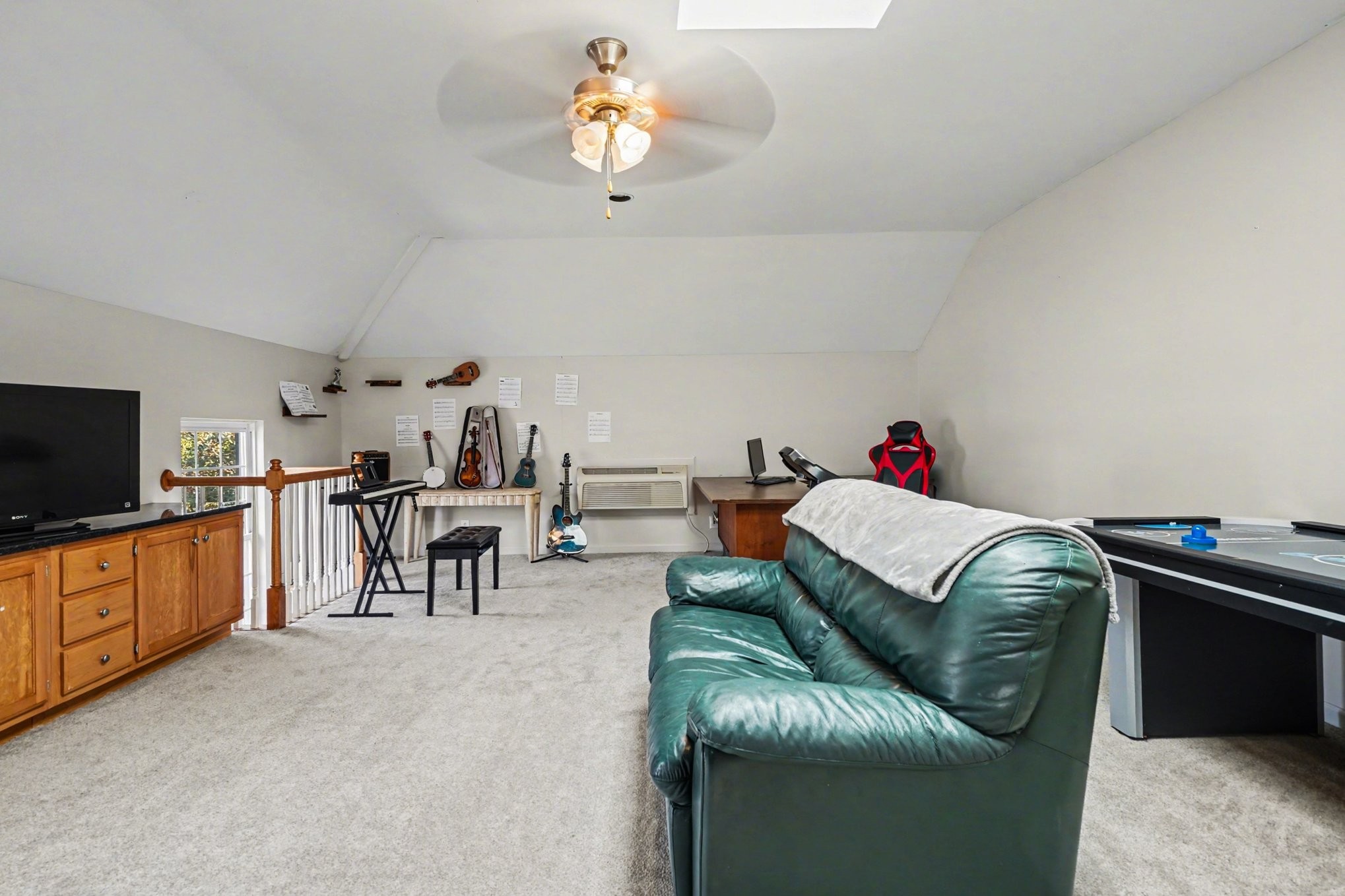 1510 Rapids Road Portland, TN 37148 - Photo 19 of 33 a living room with furniture and a flat screen tv