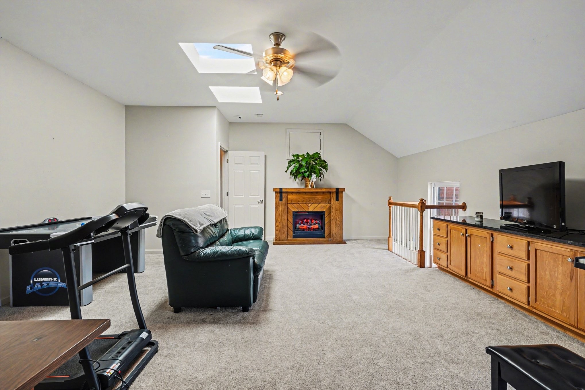 1510 Rapids Road Portland, TN 37148 - Photo 20 of 33 a living room with furniture and a flat screen tv