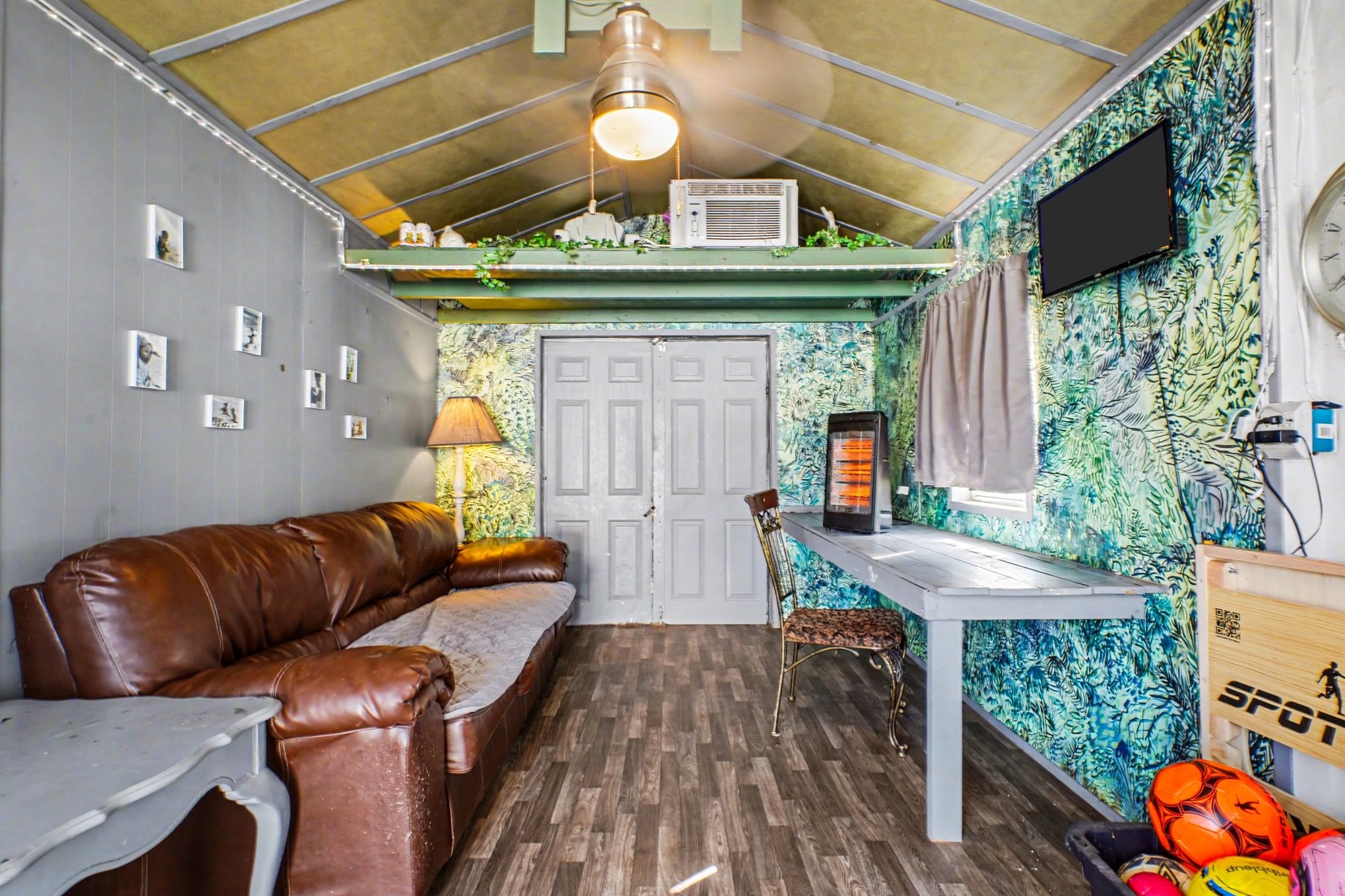 1510 Rapids Road Portland, TN 37148 - Photo 26 of 33 a living room with furniture and a wooden floor