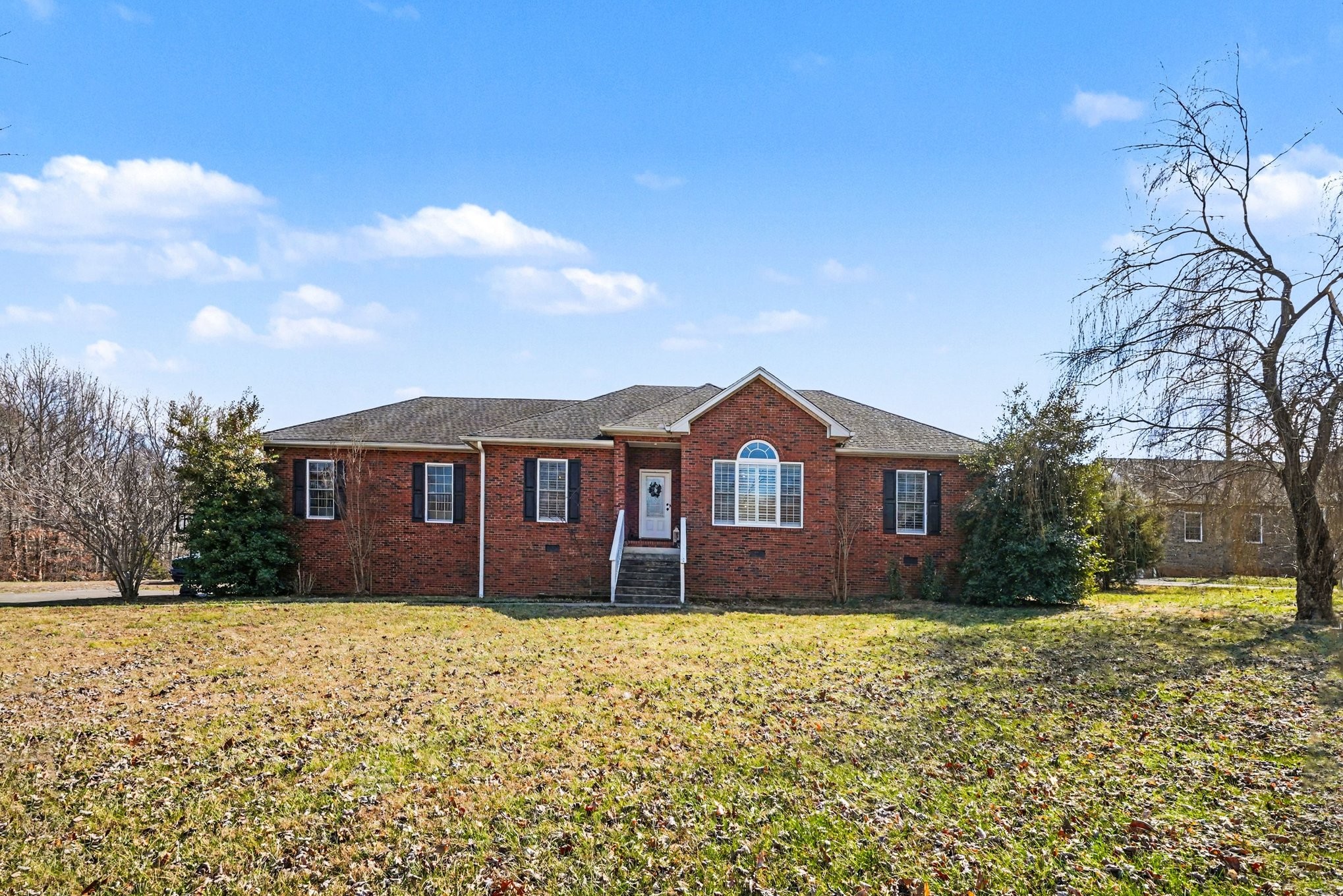 1510 Rapids Road Portland, TN 37148 - Photo 33 of 33 a front view of a house with a yard covered in snow