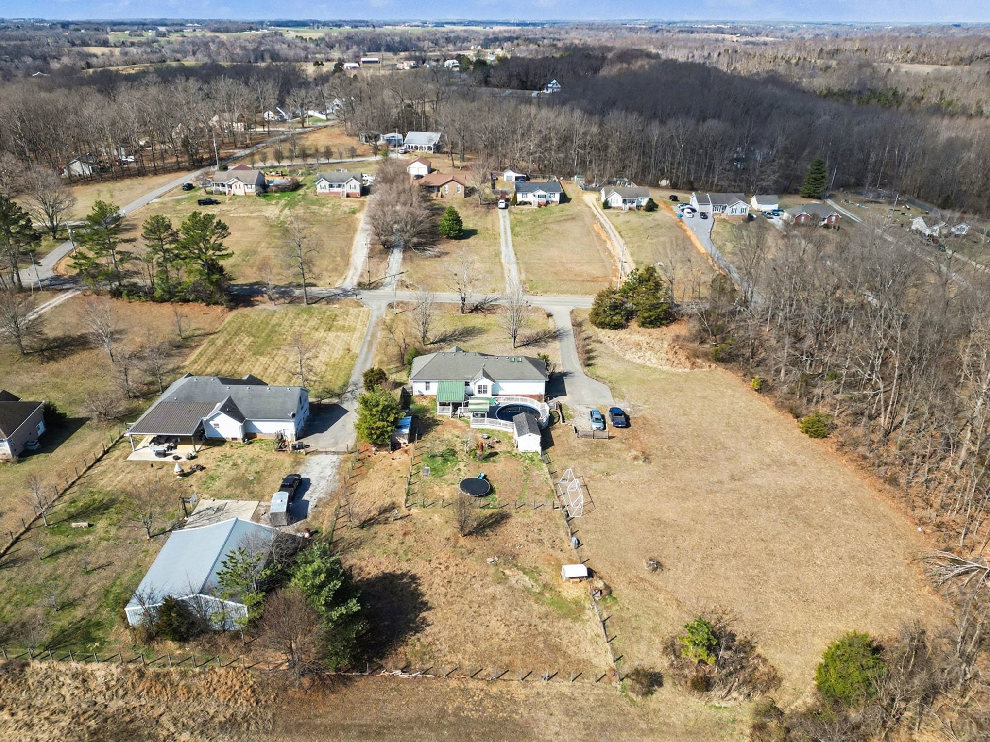 1510 Rapids Road Portland, TN 37148 - Photo 4 of 33 an aerial view of residential houses with outdoor space