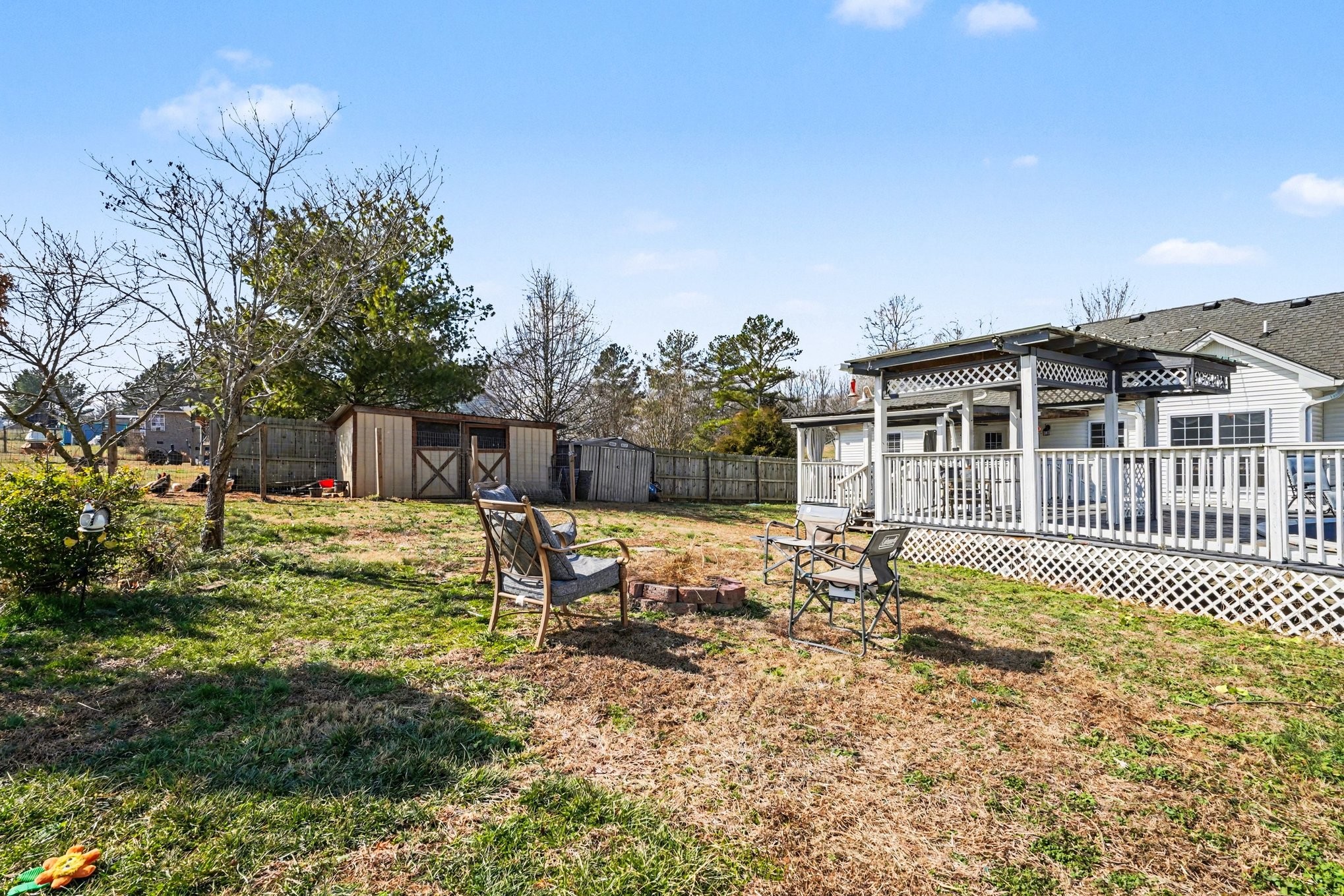 1510 Rapids Road Portland, TN 37148 - Photo 7 of 33 a view of a house with backyard and sitting area