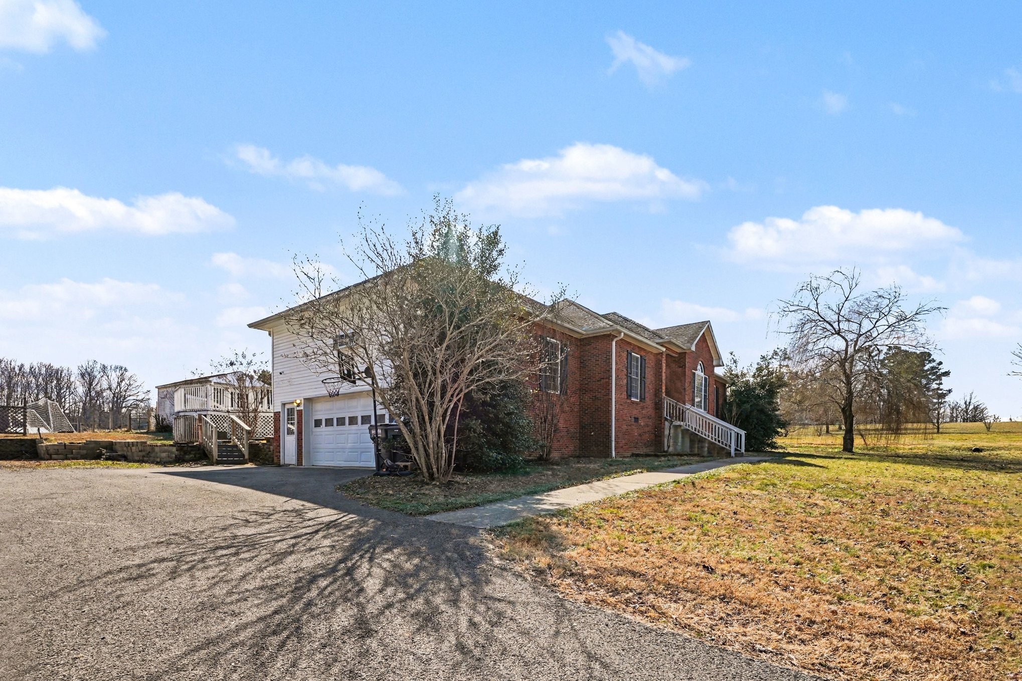 1510 Rapids Road Portland, TN 37148 - Photo 9 of 33 a view of a road with a building in the background