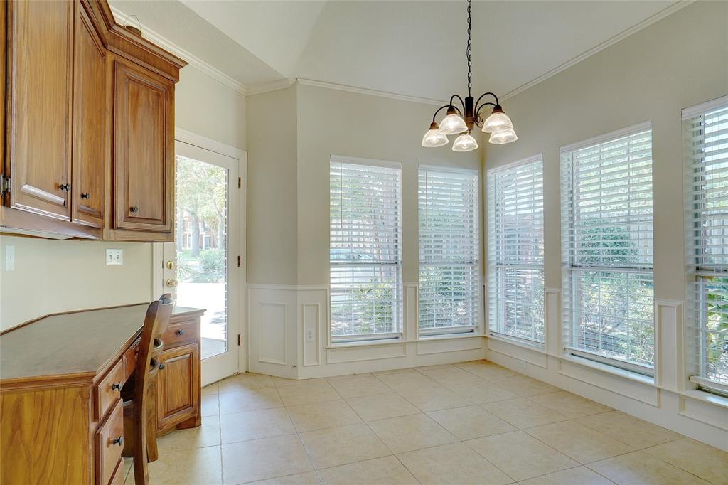 203 Donley Court Southlake, TX 76092 - Photo 11 of 21 a view of a room with windows and chandelier