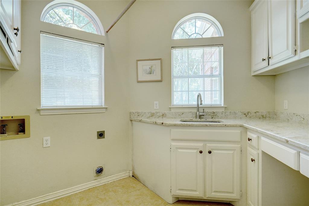 203 Donley Court Southlake, TX 76092 - Photo 21 of 21 a bathroom with a sink a toilet and a window