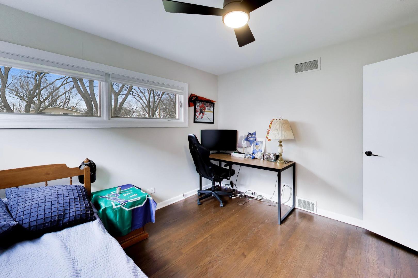 108 West Sunset Road Mount Prospect, IL 60056 - Photo 20 of 40 a workspace with furniture and window
