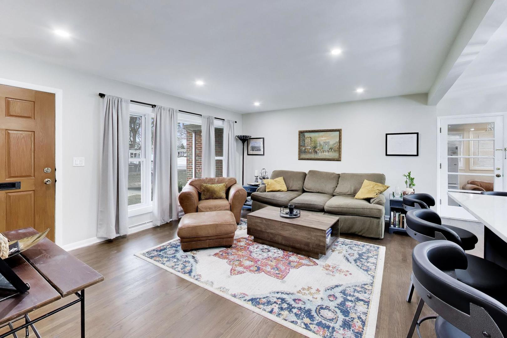 108 West Sunset Road Mount Prospect, IL 60056 - Photo 6 of 40 a living room with furniture and wooden floor