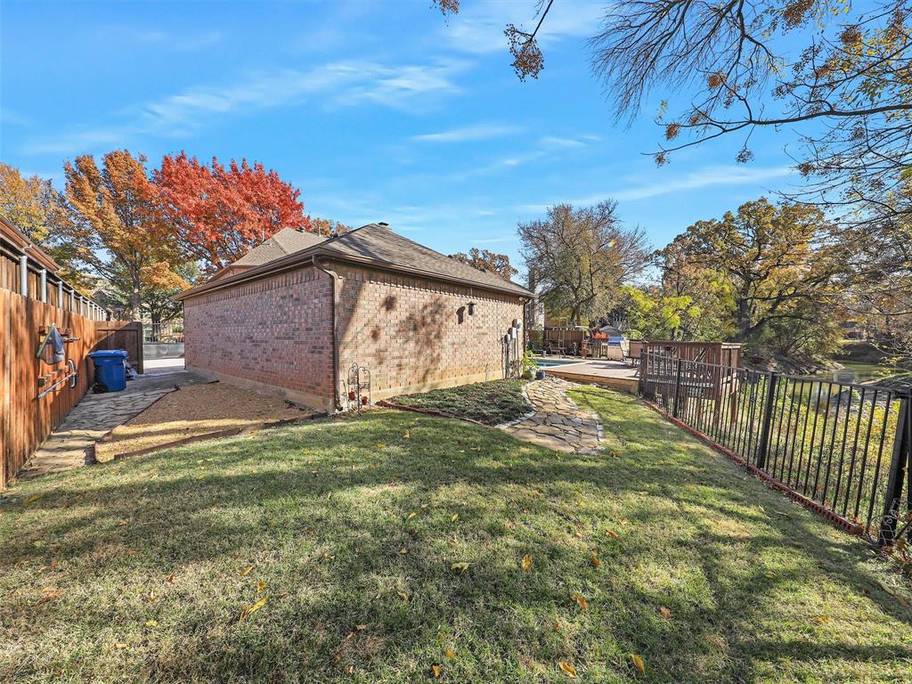 723 Bent Tree Court Coppell, TX 75019 - Photo 38 of 39 a view of a backyard