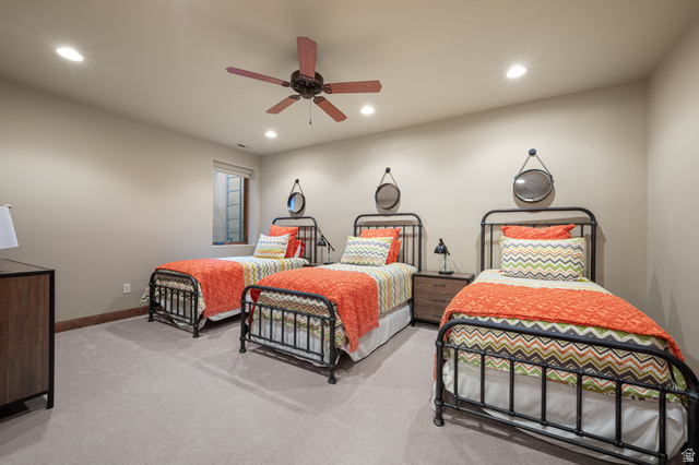 2331 West Entrada Trail, Unit 61 St. George, UT 84770 - Photo 46 of 69 Carpeted room featuring a ceiling fan with integrated lighting, recessed lighting, and a window with a wood-finish frame