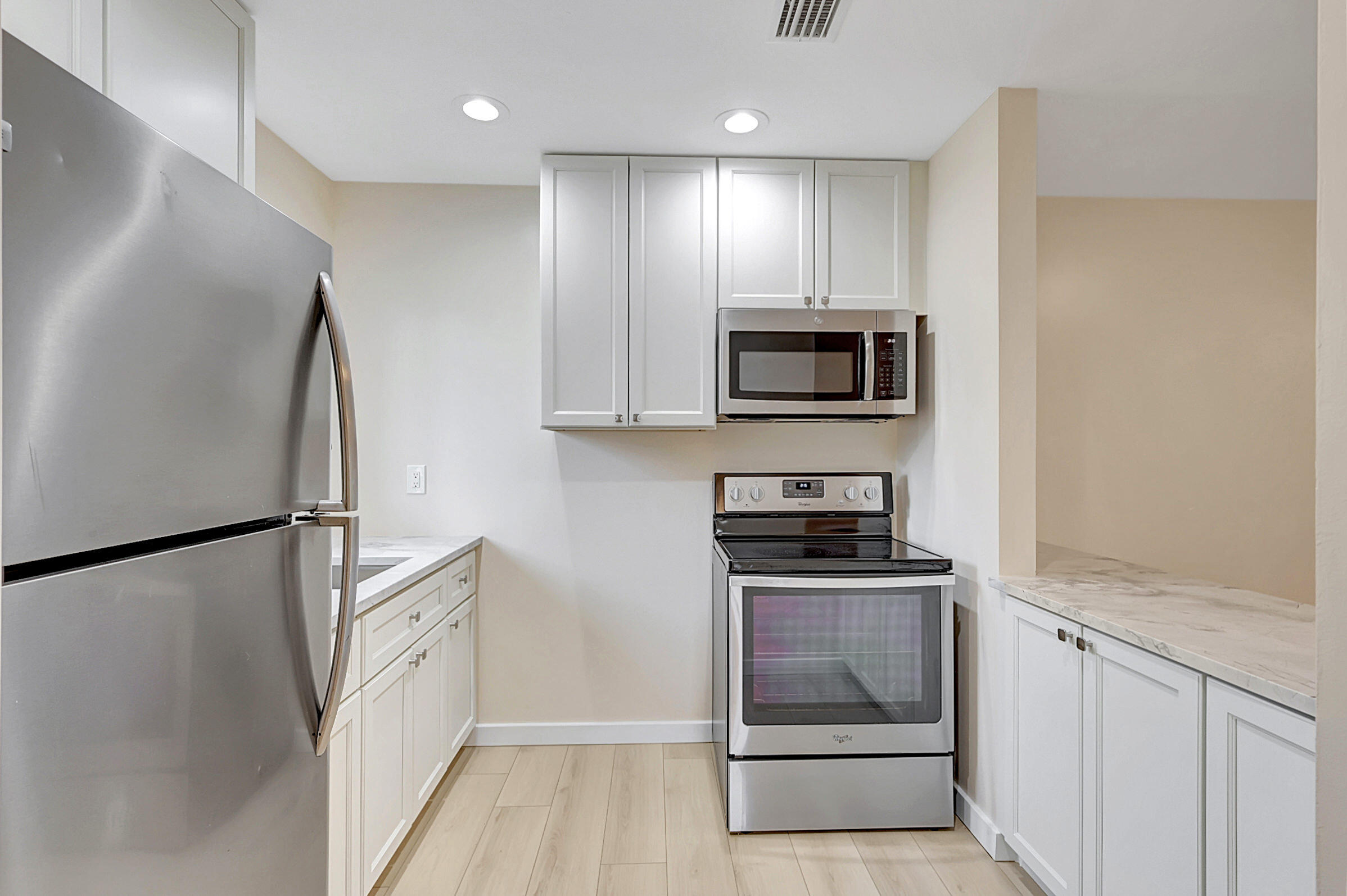 4669-4667 Southeast Salvatori Road Stuart, FL 34997 - Photo 13 of 52 Renovated Kitchen Right Unit