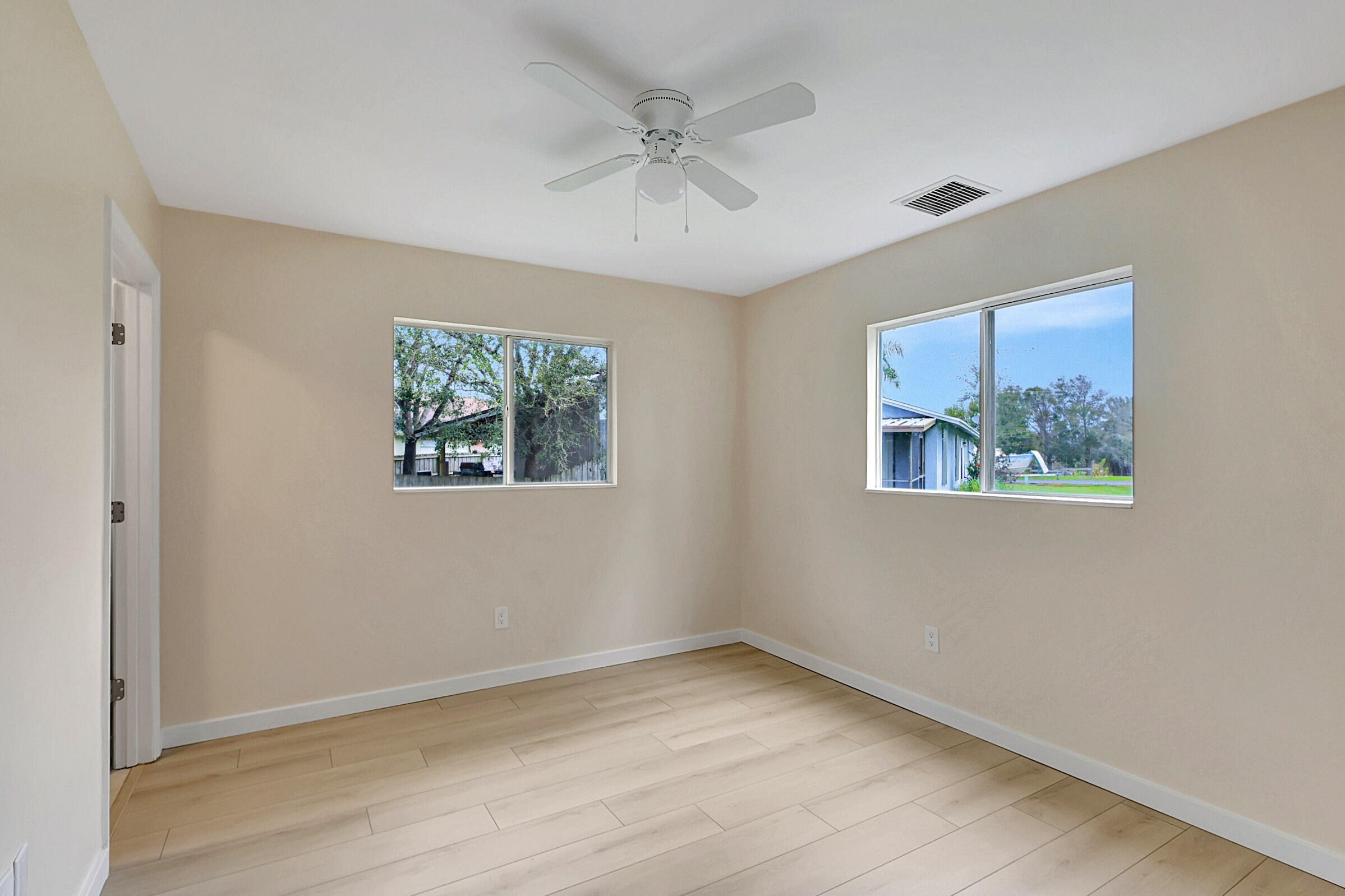 4669-4667 Southeast Salvatori Road Stuart, FL 34997 - Photo 20 of 52 Primary Bedroom Right Unit
