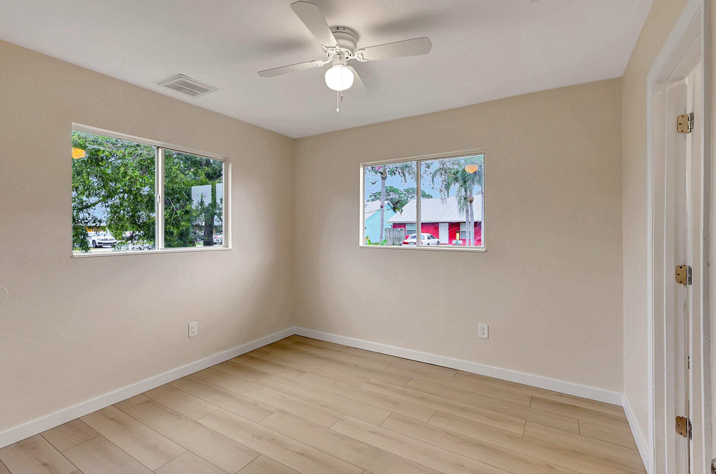 4669-4667 Southeast Salvatori Road Stuart, FL 34997 - Photo 26 of 52 Renovated Guest Bedroom