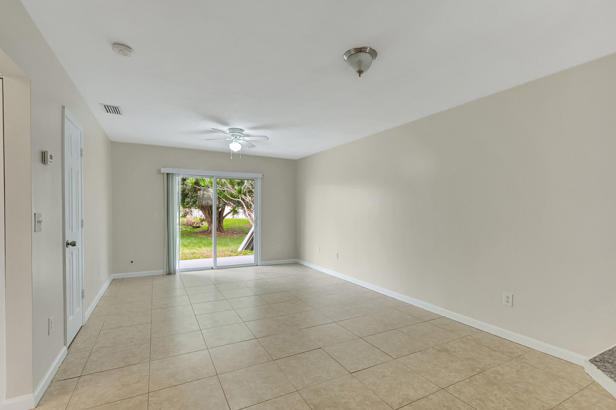 4669-4667 Southeast Salvatori Road Stuart, FL 34997 - Photo 38 of 52 Slider Access To Back