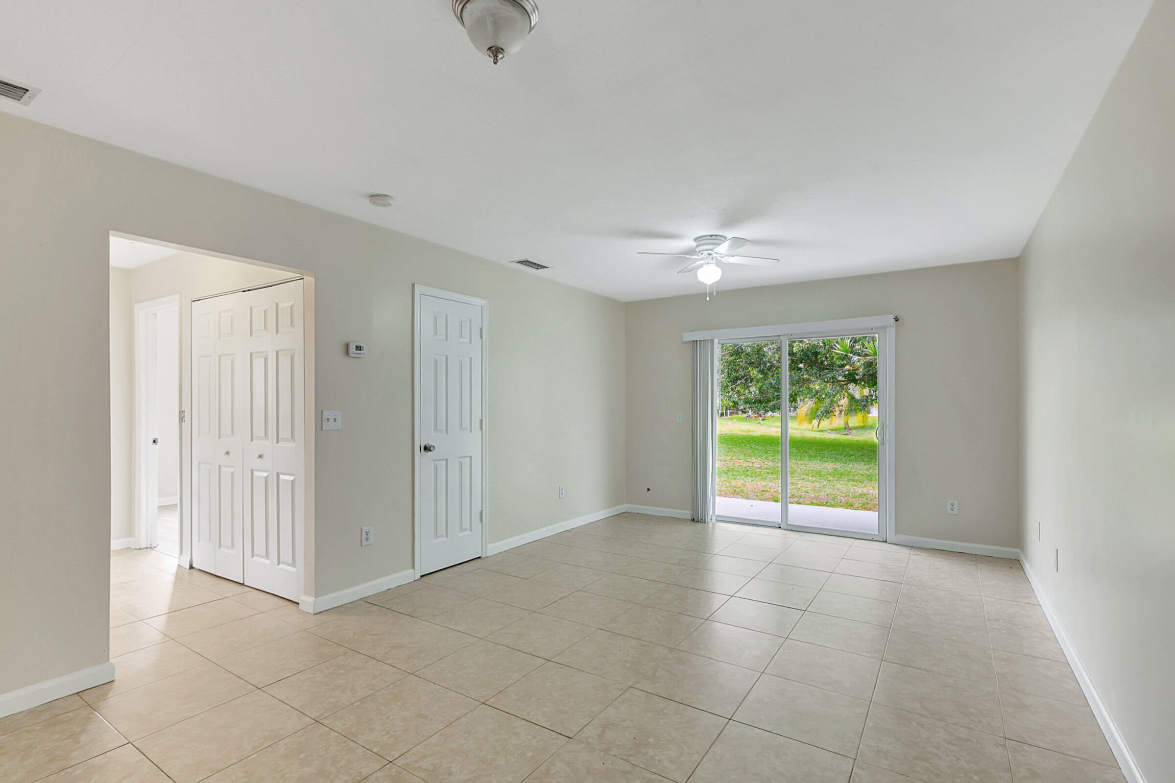 4669-4667 Southeast Salvatori Road Stuart, FL 34997 - Photo 39 of 52 Large Living Room