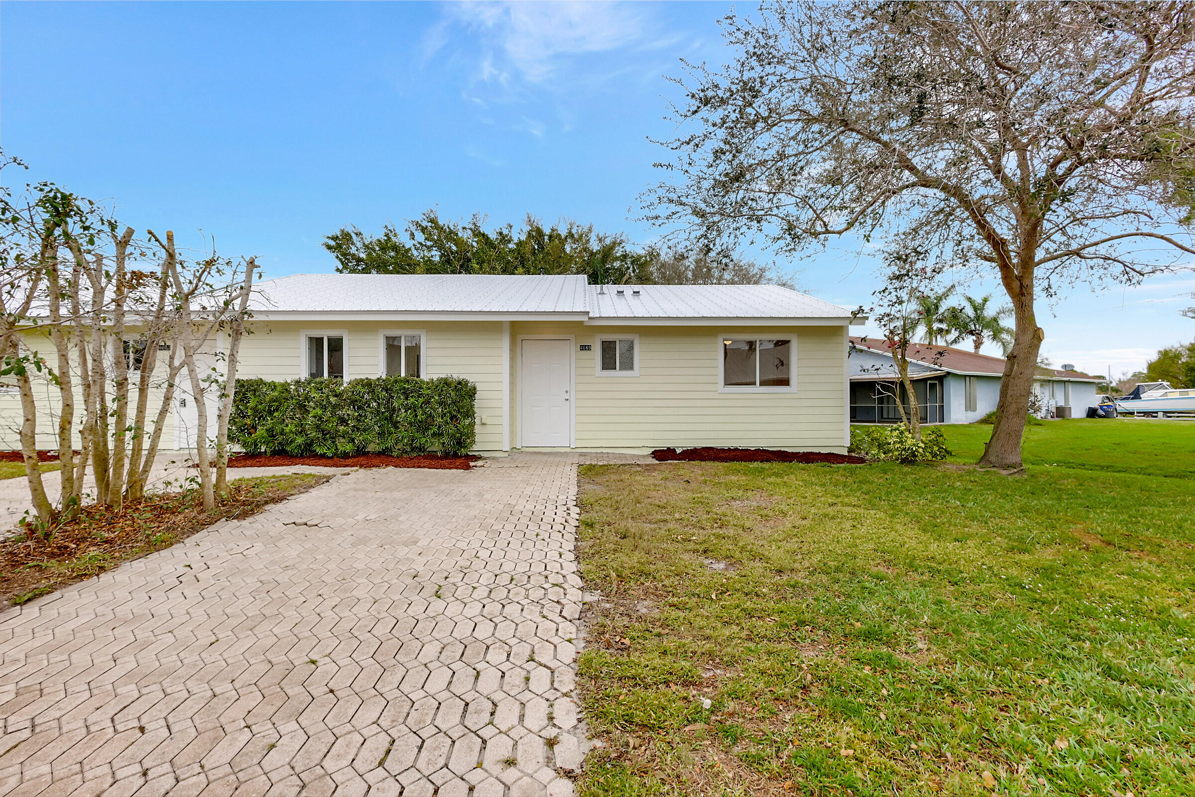 4669-4667 Southeast Salvatori Road Stuart, FL 34997 - Photo 5 of 52 Right Side Renovated
