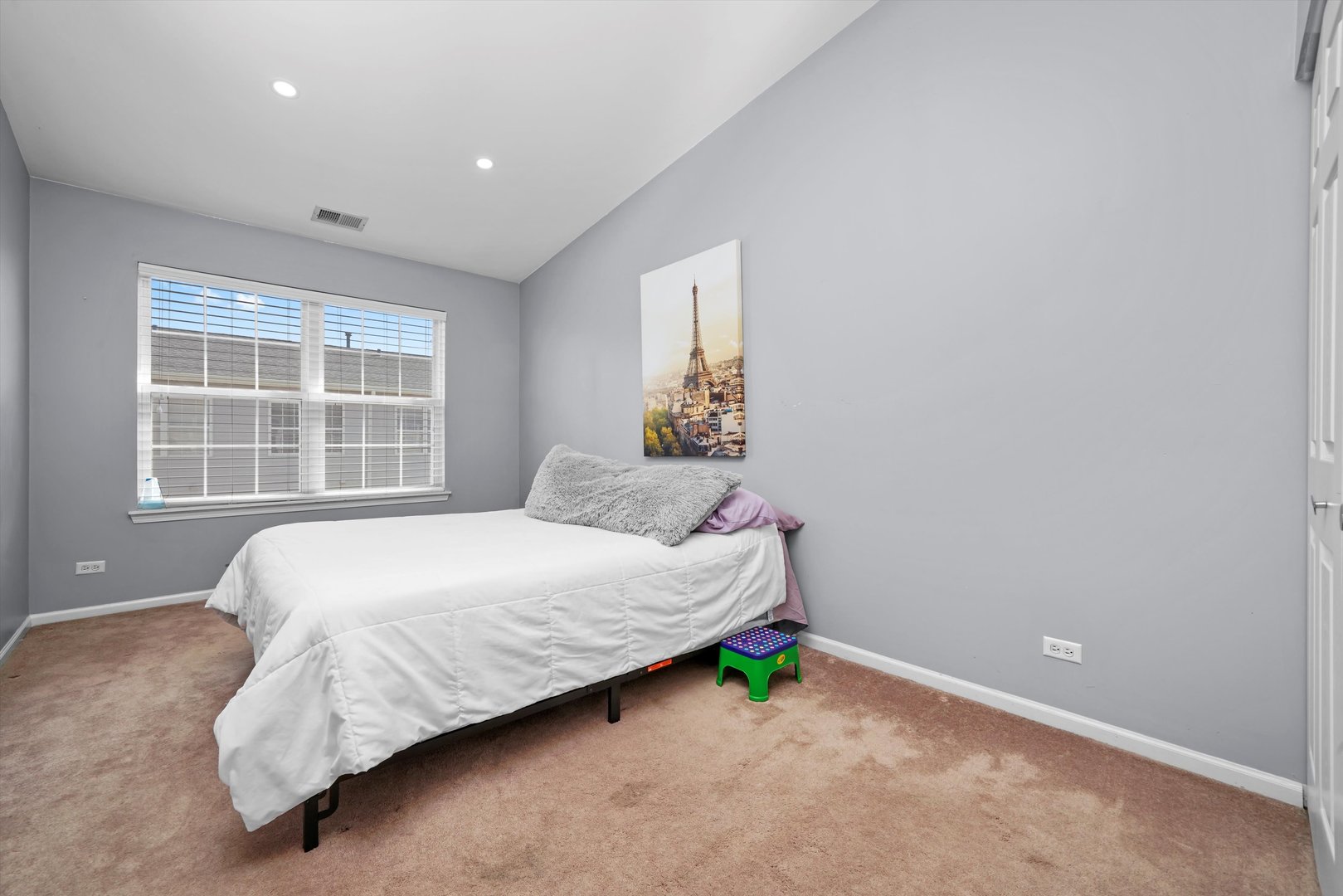 284 Holiday Lane Hainesville, IL 60073 - Photo 20 of 34 a bedroom with a bed and window