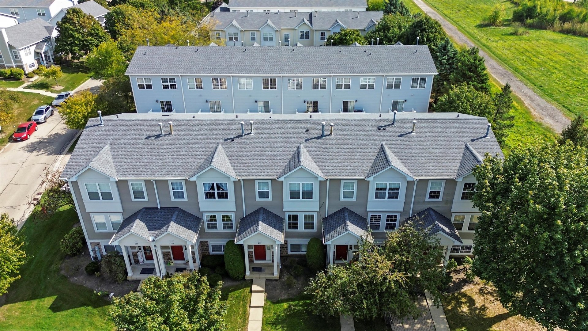 284 Holiday Lane Hainesville, IL 60073 - Photo 28 of 34 an aerial view of residential houses with outdoor space and seating area