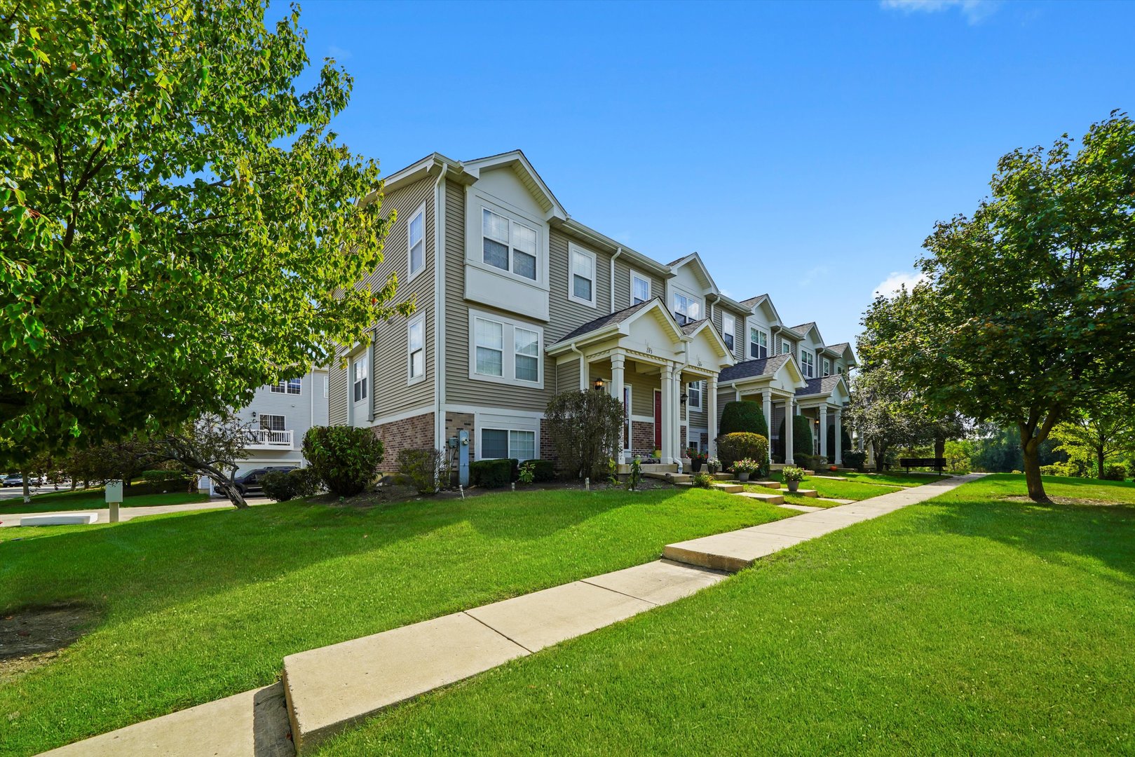 284 Holiday Lane Hainesville, IL 60073 - Photo 30 of 34 a front view of a house with a yard