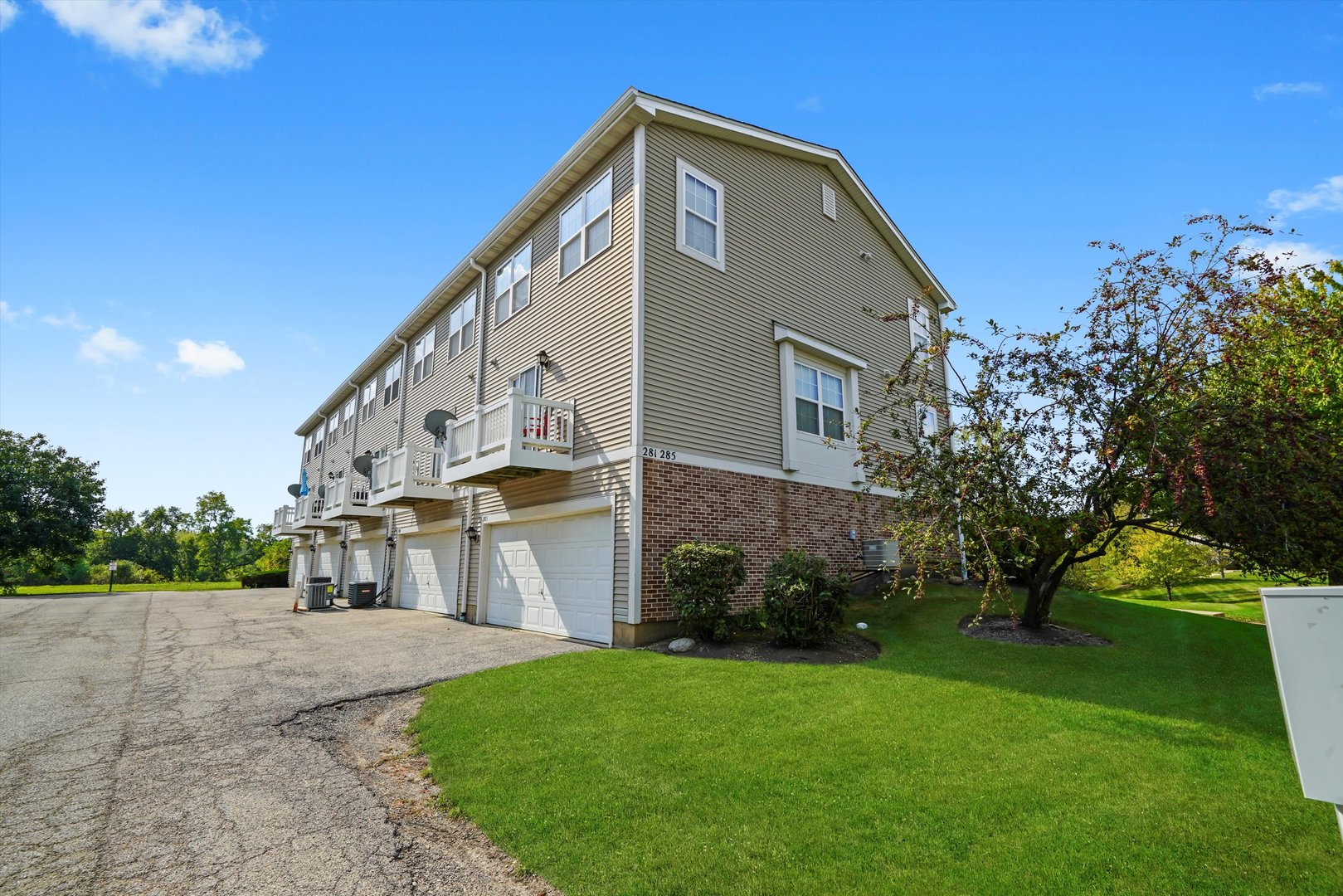 284 Holiday Lane Hainesville, IL 60073 - Photo 5 of 34 a view of house with yard and green space