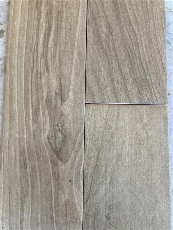 4590 28th Avenue Southwest Naples, FL 34116 - Photo 28 of 37 a bathroom with a shower