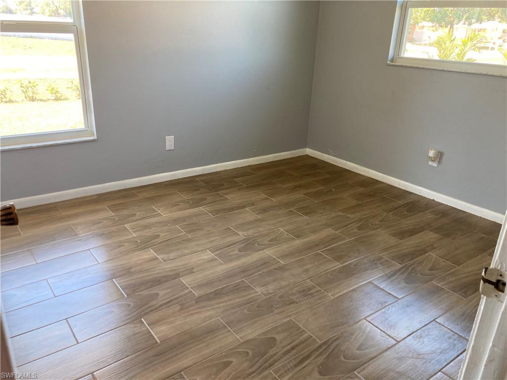 4590 28th Avenue Southwest Naples, FL 34116 - Photo 30 of 37 en empty room with window