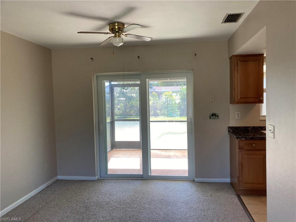 4590 28th Avenue Southwest Naples, FL 34116 - Photo 37 of 37 a view of an empty room with a window