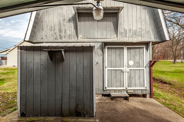 a view of a house with a door and a window