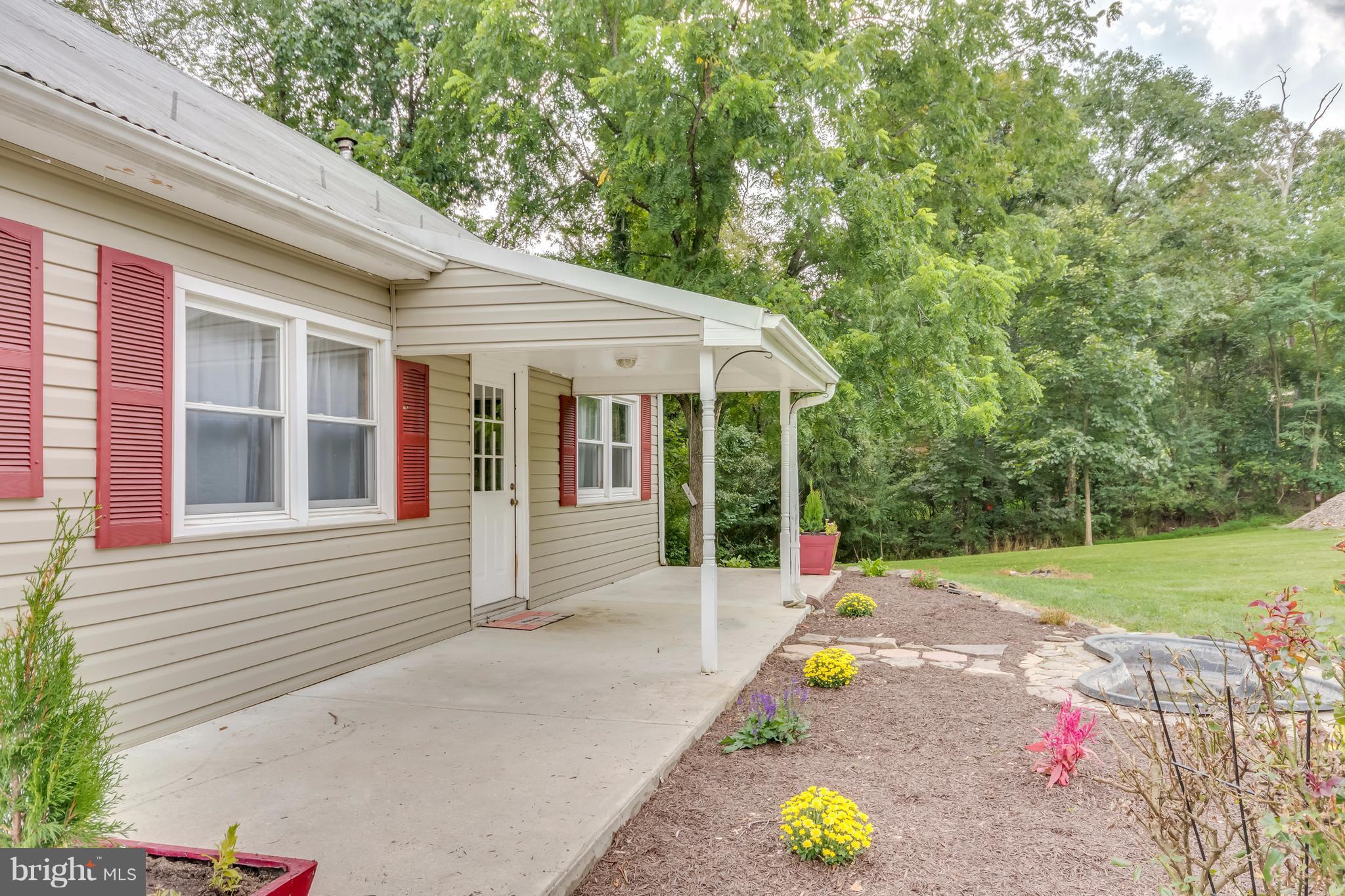 283 Earl Weber Road Berkeley Springs, WV 25411 - Photo 3 of 27 Exterior (Front)