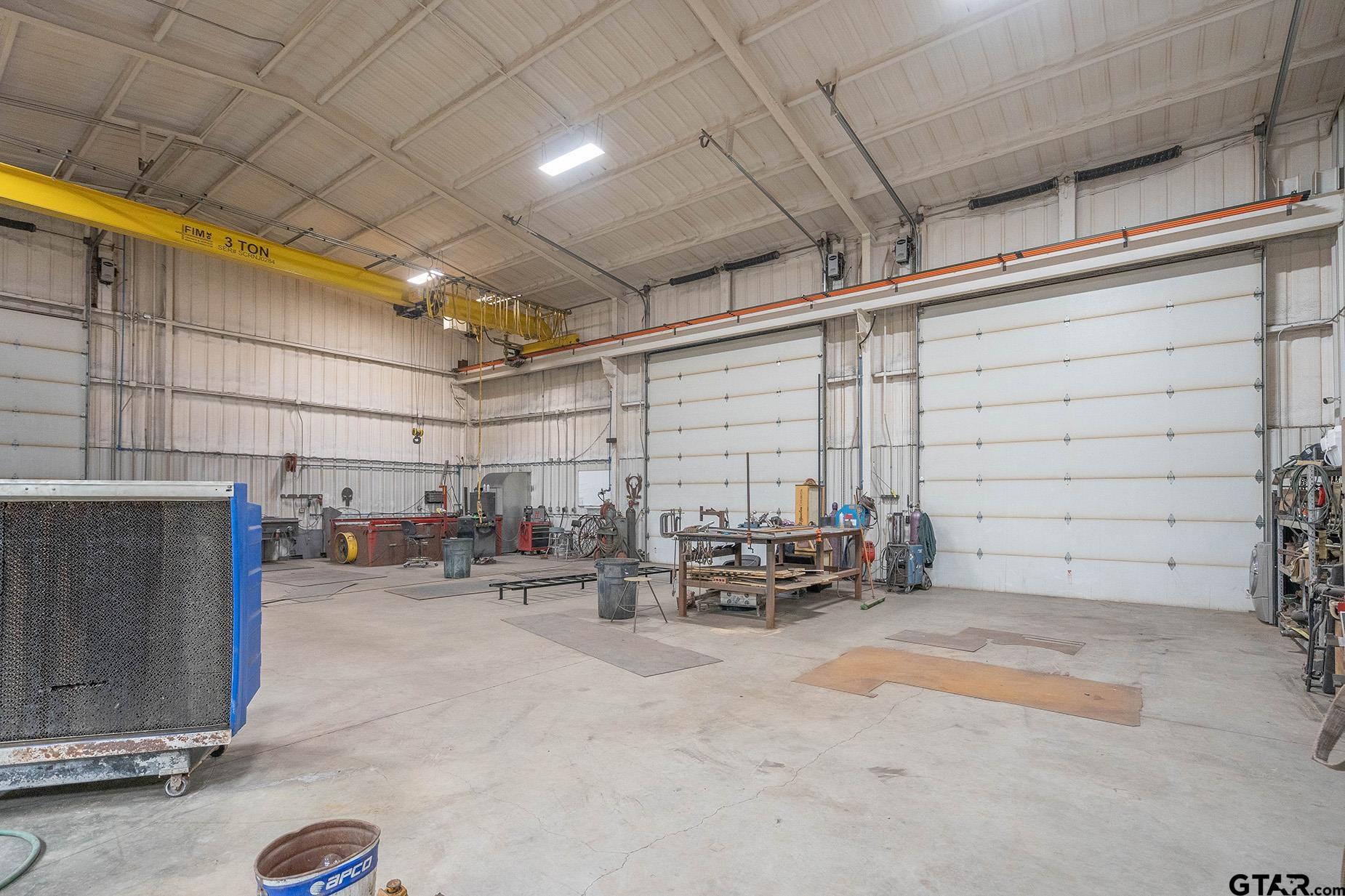 6523 North Sparta Avenue Odessa, TX 79764 - Photo 17 of 38 a view of parking garage with parked