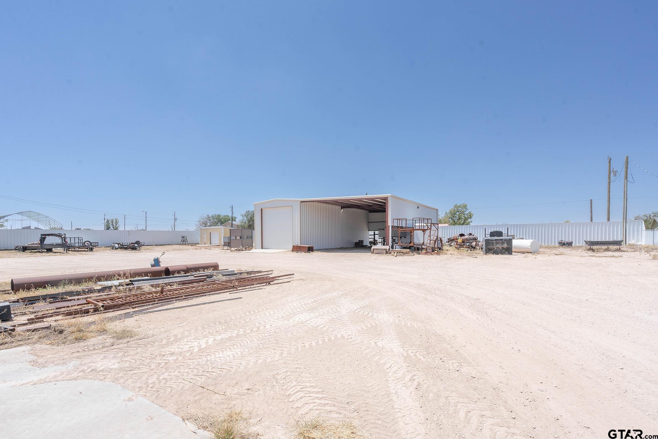 6523 North Sparta Avenue Odessa, TX 79764 - Photo 34 of 38 a view of a kitchen with a sink and cabinets